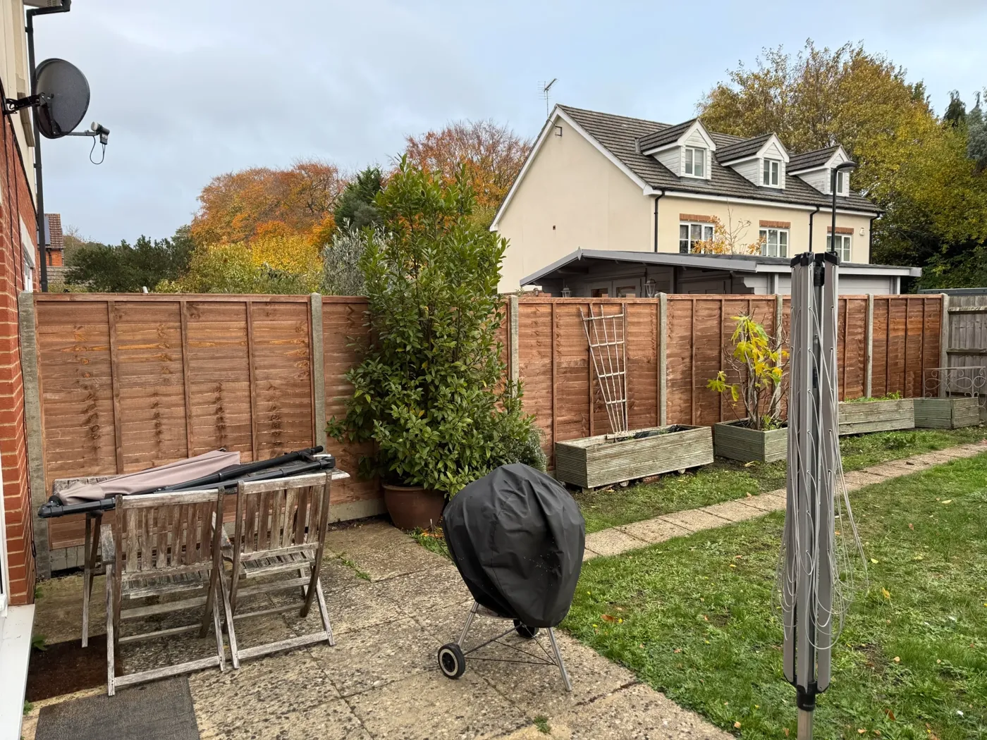 New timber fence installed along a garden boundary